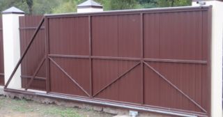 Купить откатные ворота из профнастила Мирный, цена от 1742 руб.