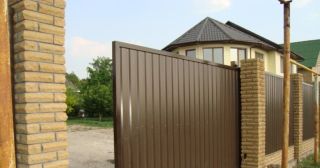 Купить откатные ворота из профнастила Мирный, цена от 1742 руб.